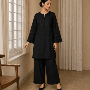 Black cotton lawn button-down kurta with lace cuffs paired with palazzo – front view