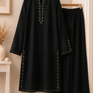 Black front placket embroidered cotton lawn kurta and palazzo suit on hanger