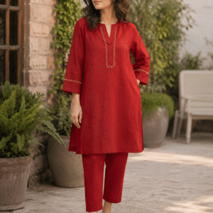 Red cotton lawn kurta with golden cross stitch embroidery paired with trouser – model wearing