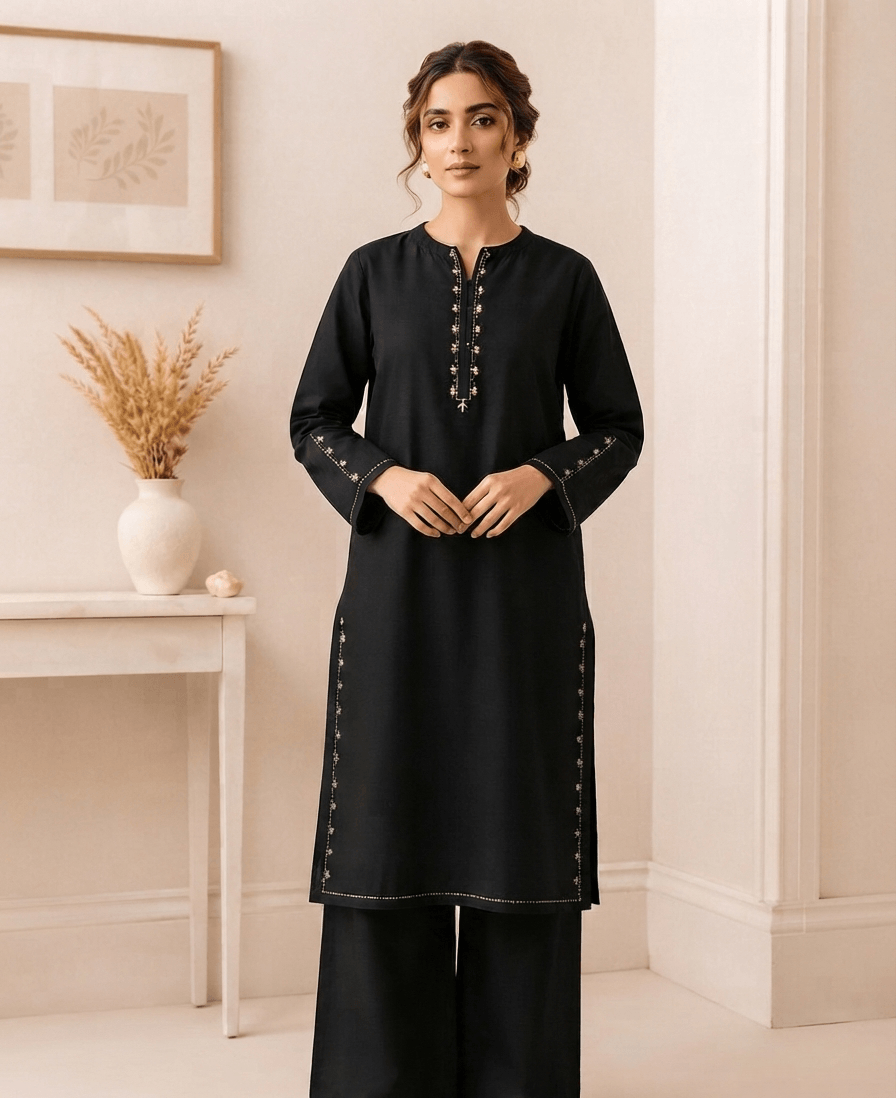 Black cotton lawn kurta with front placket embroidery paired with palazzo – model wearing