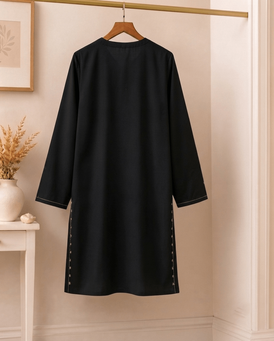 Close-up of front placket and side panel embroidery on black cotton lawn kurta